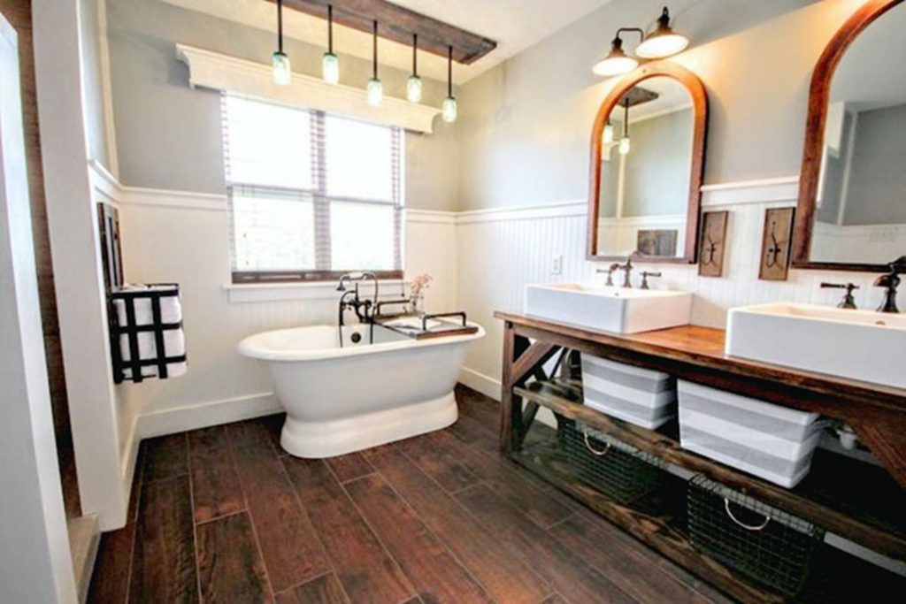 Awesome Farmhouse Master Bathroom With Dark Wood Floor And Mirror Decor Ideas