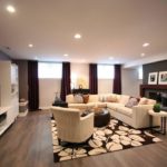 Amazing Basement Renovation Living Space Design With Movie Room source Stratagem Construction