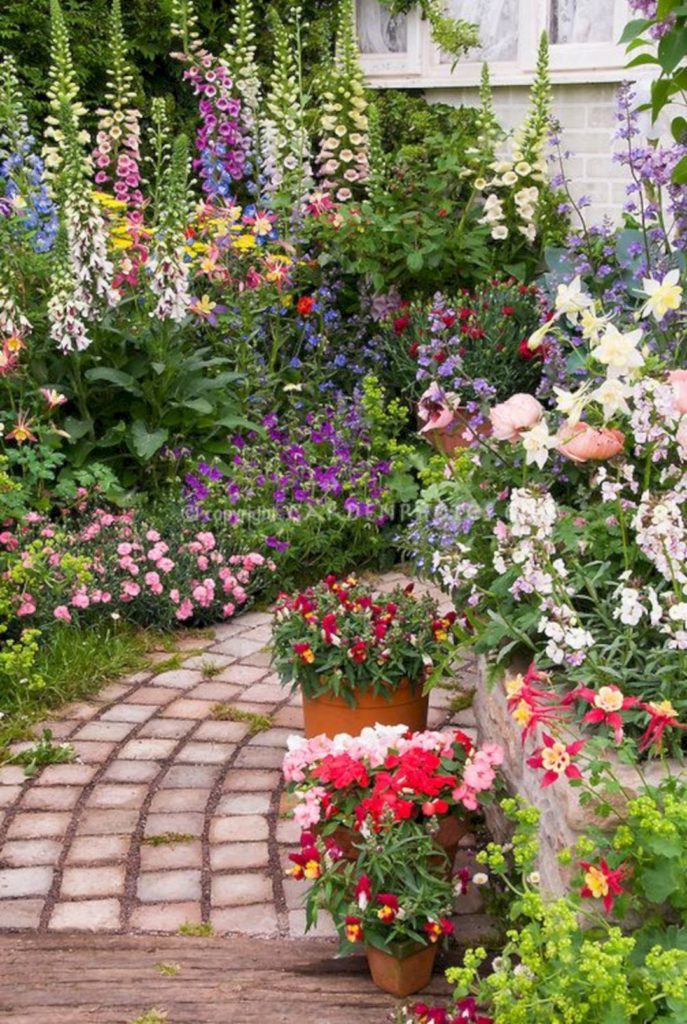 Stone Garden Path with lush flower garden